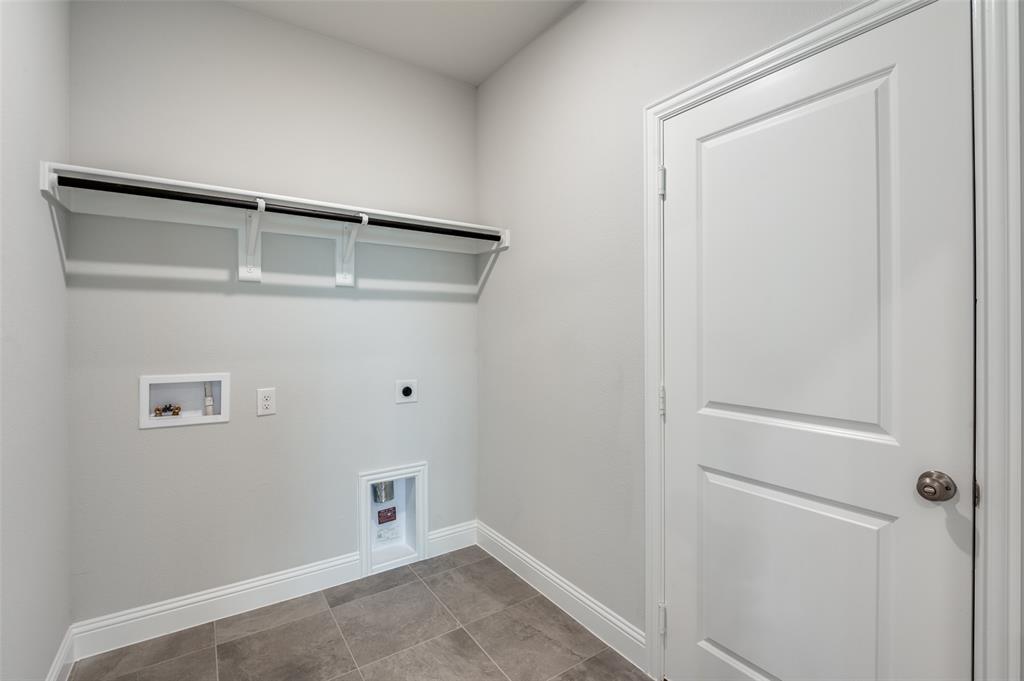 832 Santa Lucia Drive Anna, TX 75409 - Photo 18 of 33 Washroom with electric dryer hookup, washer hookup, and tile patterned floors