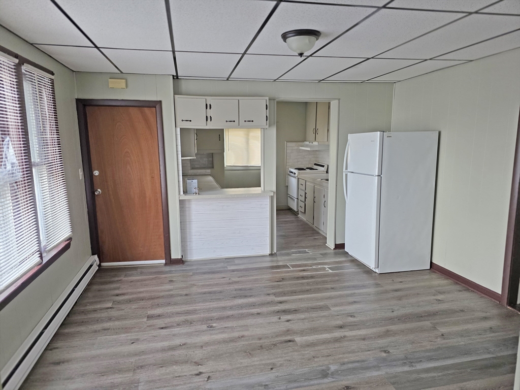 150 Forest Street Fall River, MA 02721 - Photo 9 of 9 a view of a kitchen with a refrigerator and microwave