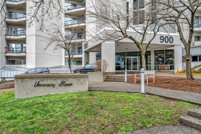 front view of a building with a yard