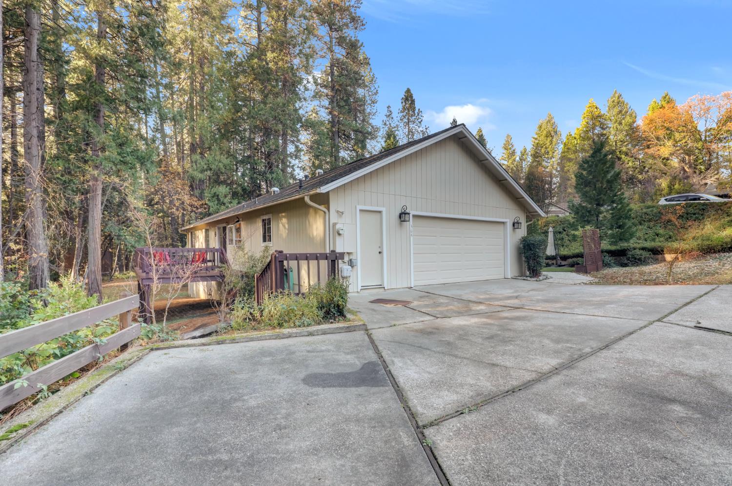 364 Gracie Road Nevada City, CA 95959 - Photo 12 of 59 a view of house with outdoor space and trees in the background