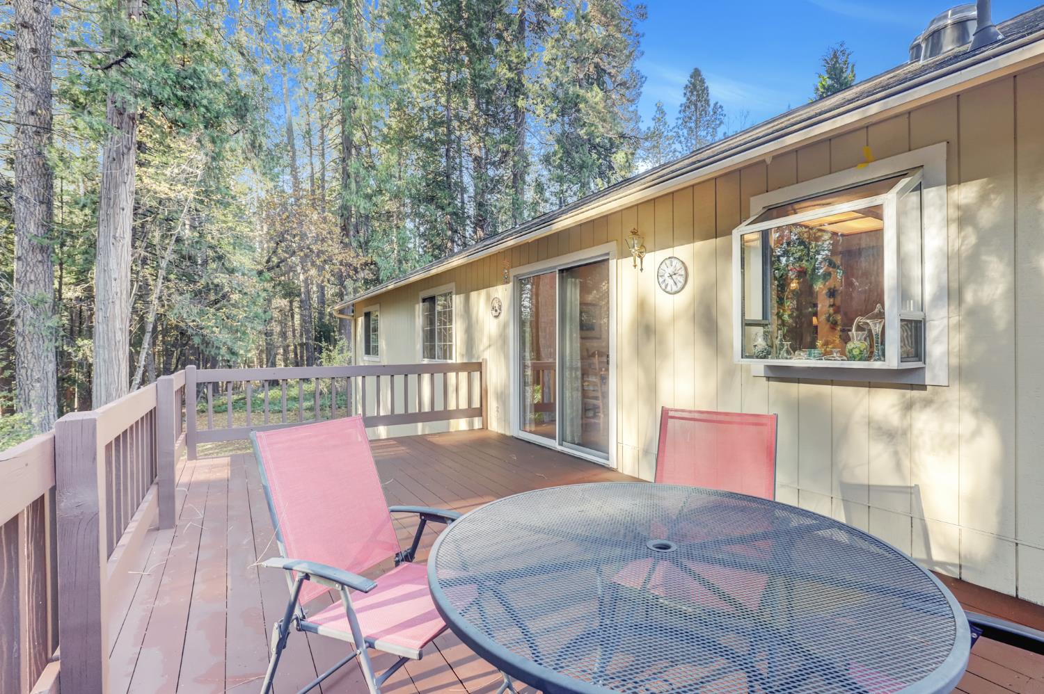 364 Gracie Road Nevada City, CA 95959 - Photo 16 of 59 a view of balcony with furniture and wooden deck