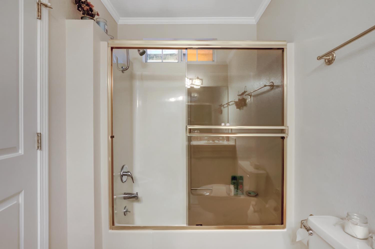 364 Gracie Road Nevada City, CA 95959 - Photo 21 of 59 a bathroom with a glass shower door