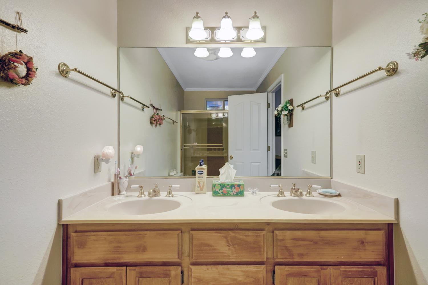 364 Gracie Road Nevada City, CA 95959 - Photo 22 of 59 a bathroom with a sink and a mirror