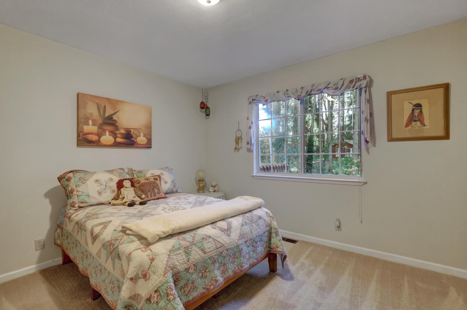 364 Gracie Road Nevada City, CA 95959 - Photo 35 of 59 a bedroom with a bed and a window