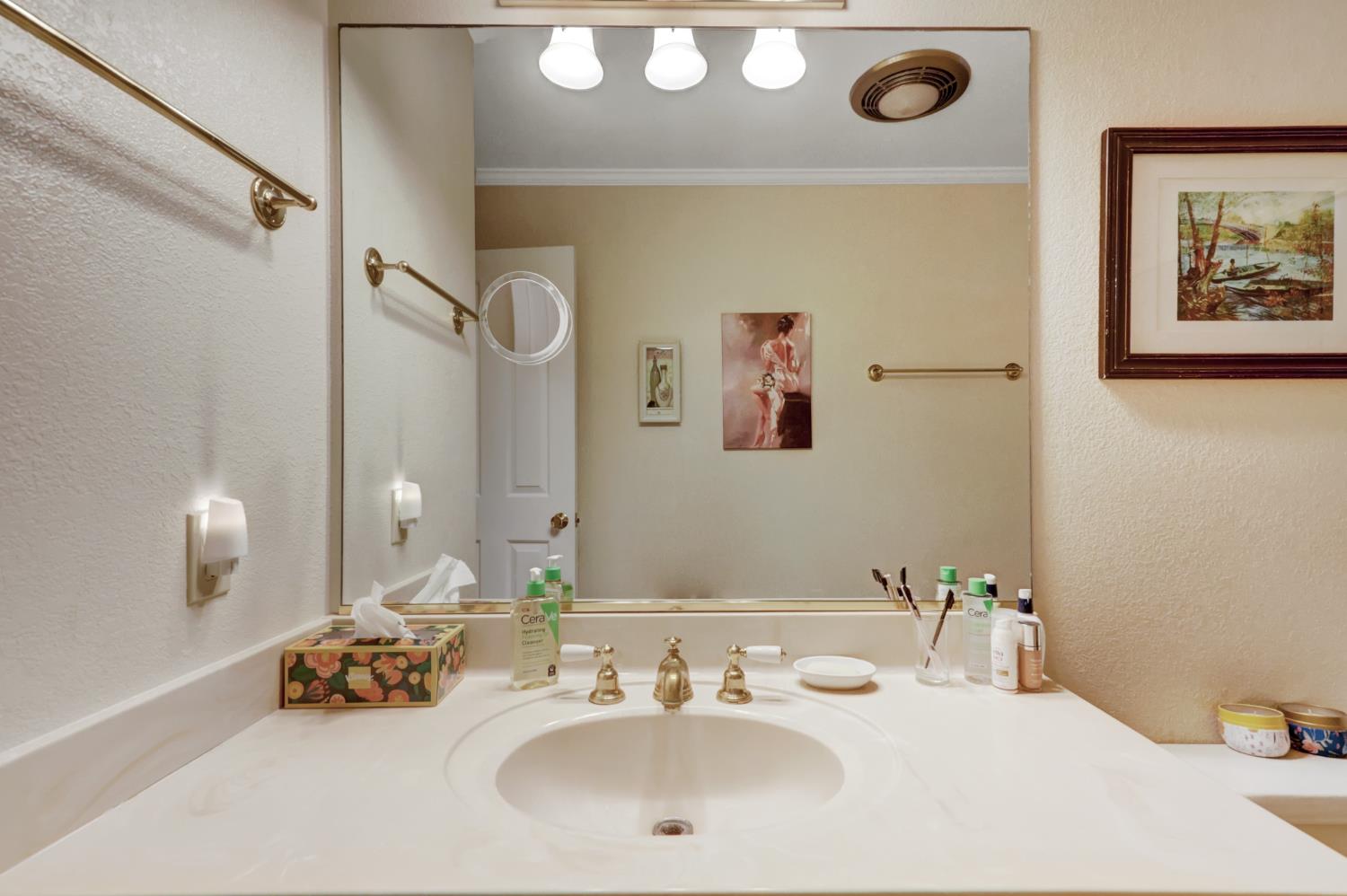 364 Gracie Road Nevada City, CA 95959 - Photo 36 of 59 a bathroom with a sink and a mirror