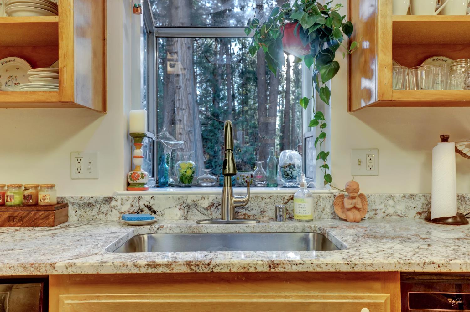 364 Gracie Road Nevada City, CA 95959 - Photo 39 of 59 a kitchen counter top a sink and a wooden floor