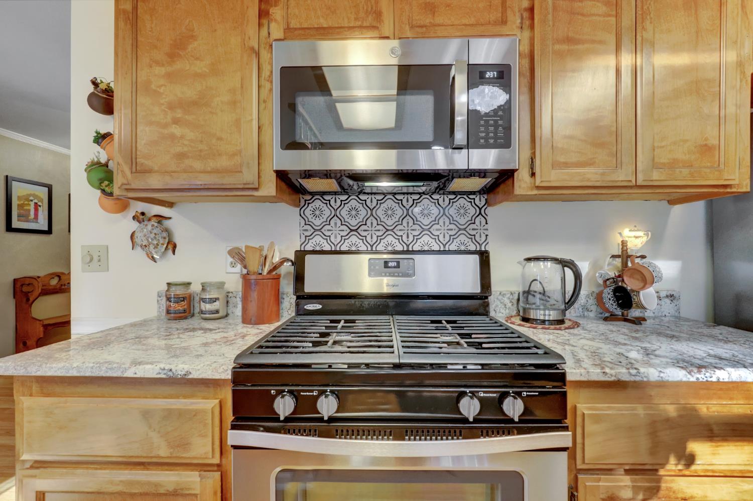 364 Gracie Road Nevada City, CA 95959 - Photo 40 of 59 a stove top oven sitting inside of a kitchen