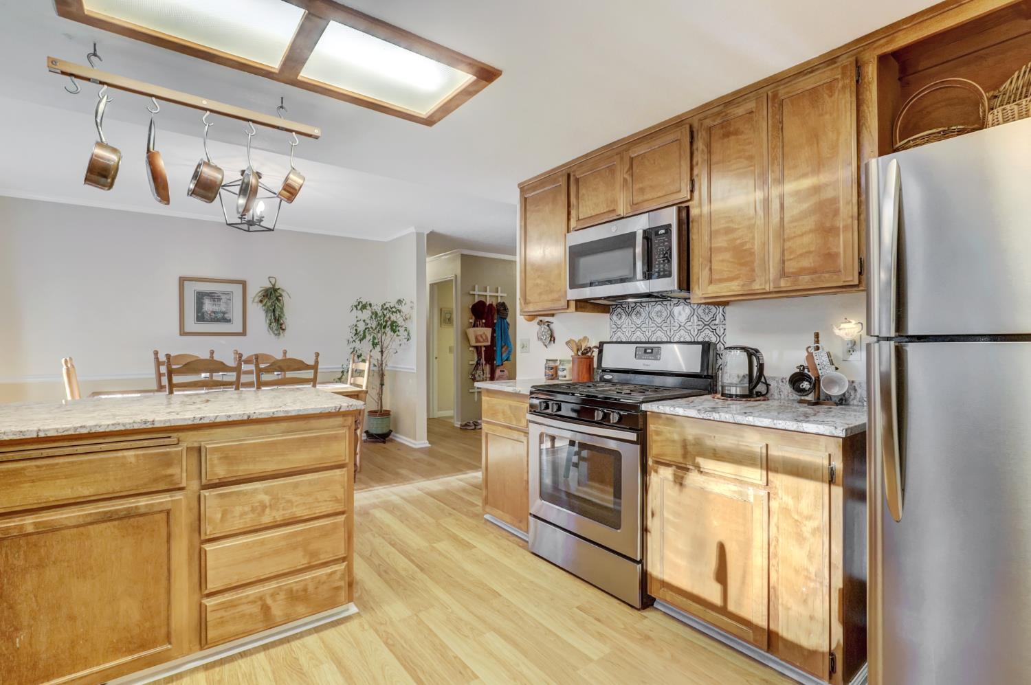 364 Gracie Road Nevada City, CA 95959 - Photo 42 of 59 a kitchen with stainless steel appliances granite countertop a refrigerator stove and sink