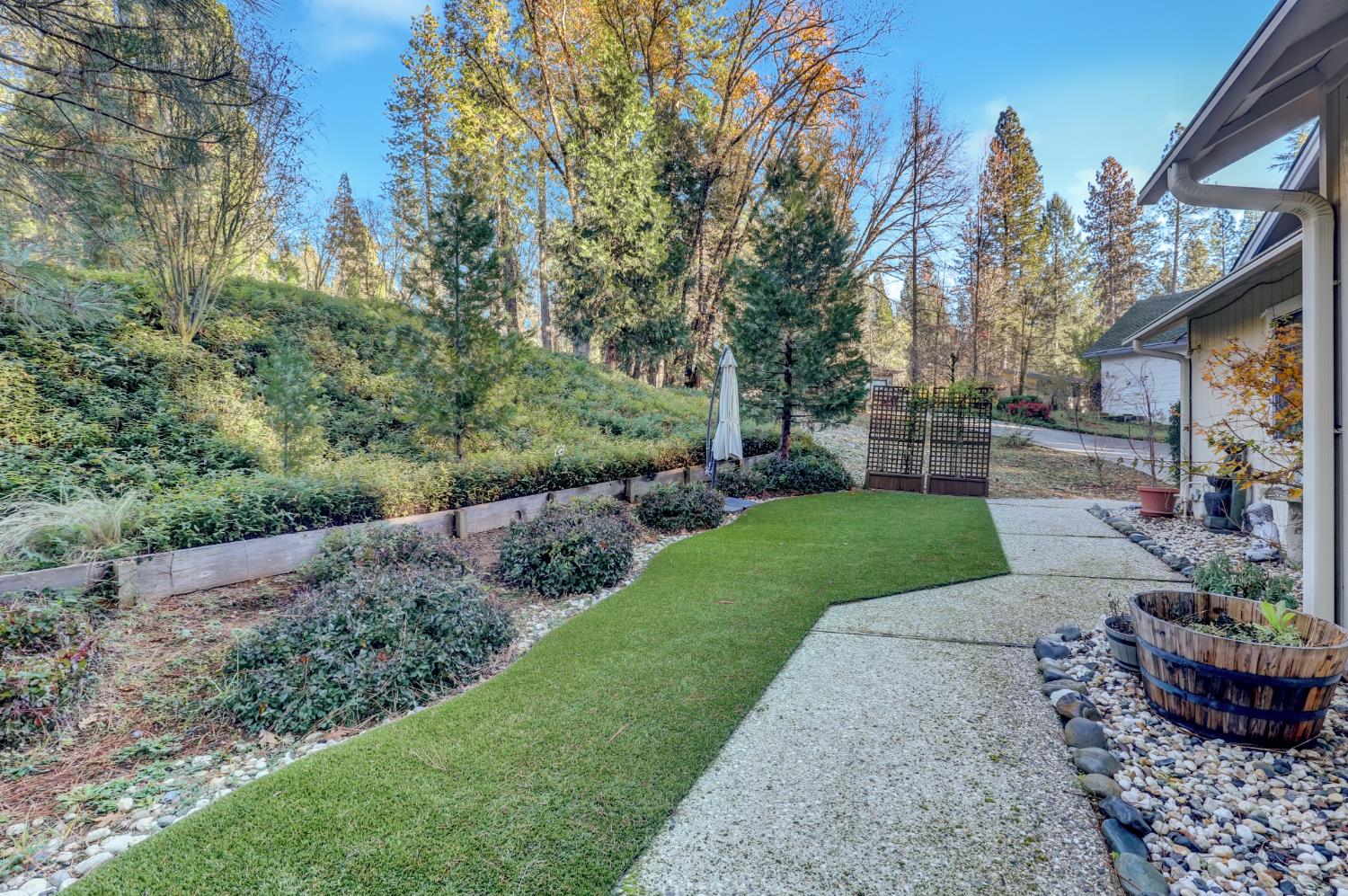 364 Gracie Road Nevada City, CA 95959 - Photo 6 of 59 a view of a garden with potted plants