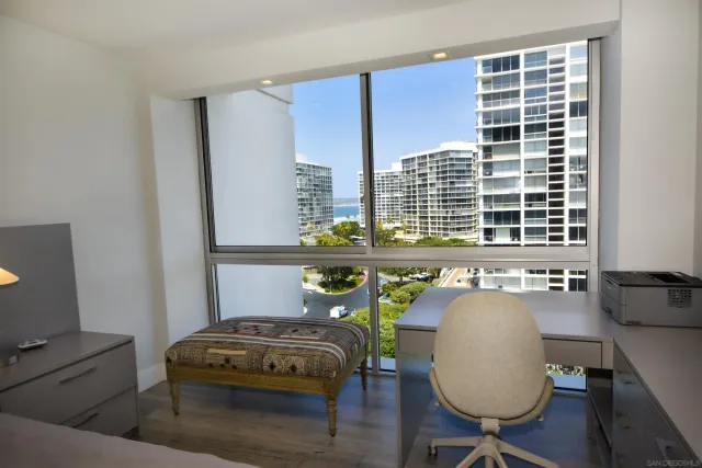 a view of a balcony with chairs