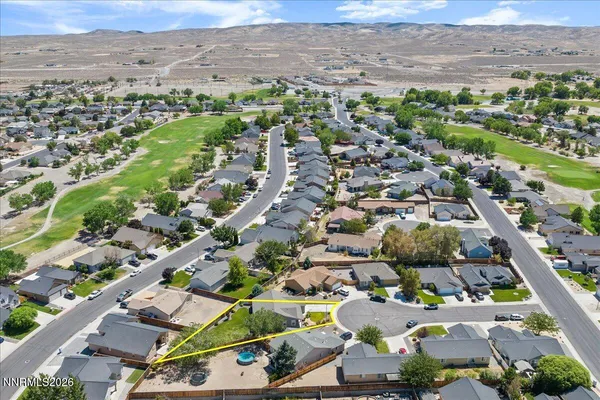 an aerial view of a city with lots of residential buildings