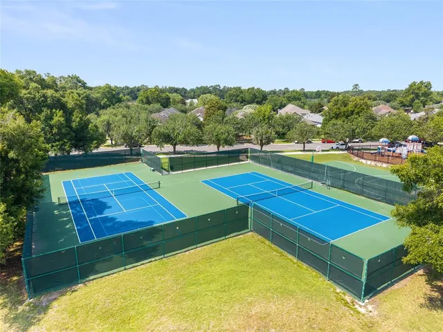 a view of swimming pool with a yard and outdoor seating