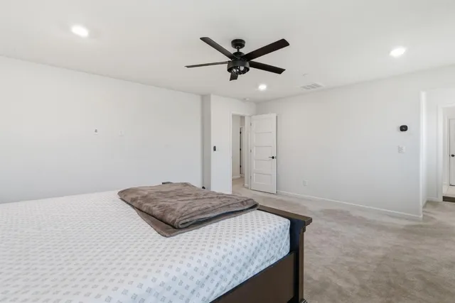 a bathroom with a double vanity sink mirror and shower
