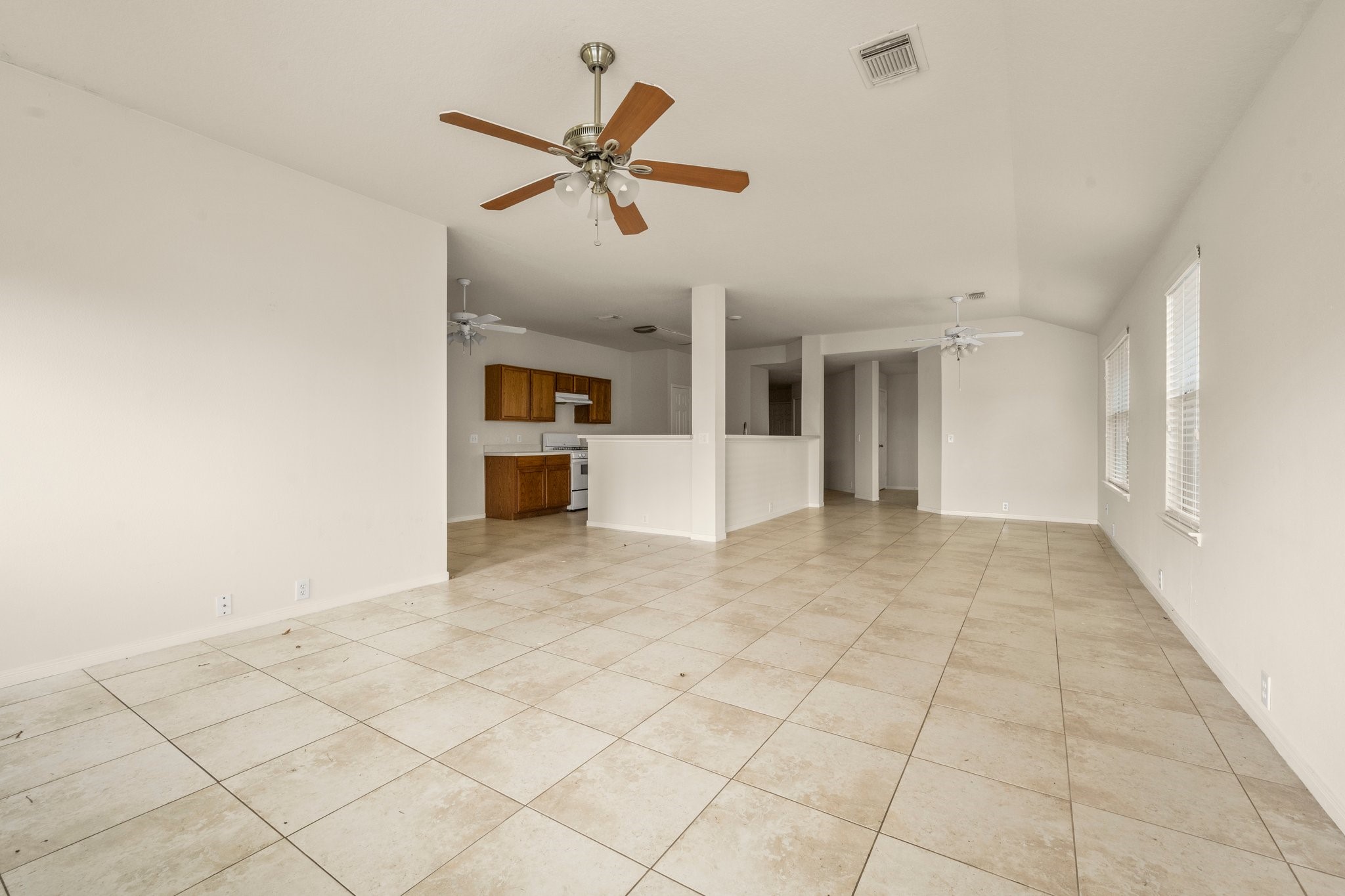 20326 Cypresswood Chase Spring, TX 77373 - Photo 11 of 25 a view of a livingroom with a ceiling fan and window
