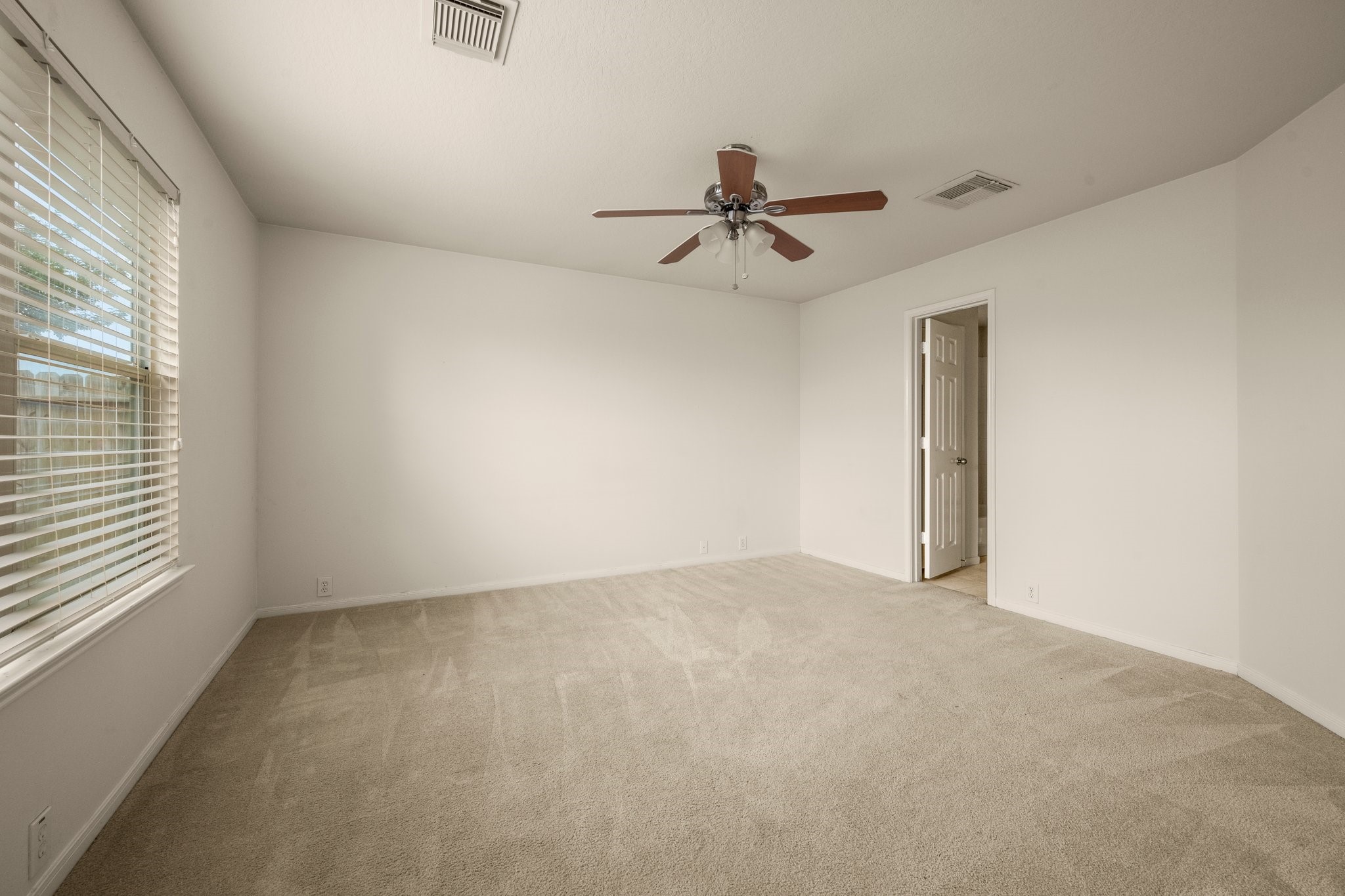 20326 Cypresswood Chase Spring, TX 77373 - Photo 16 of 25 a view of an empty room with a window