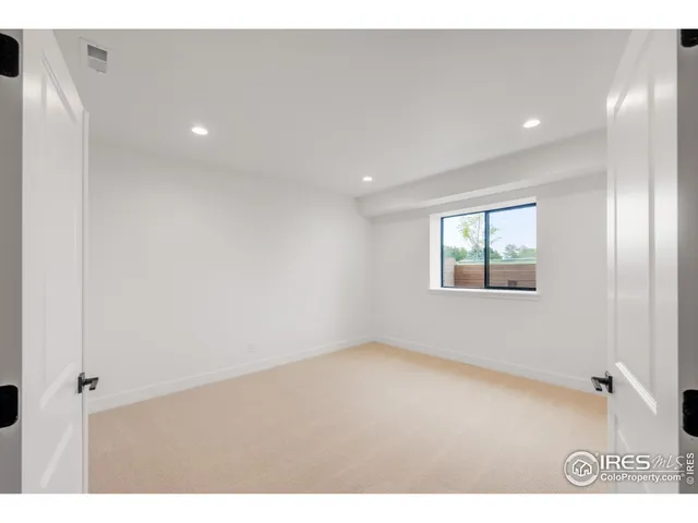 a balcony with wooden floor