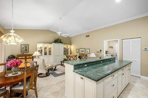 a view of a living room and dining room