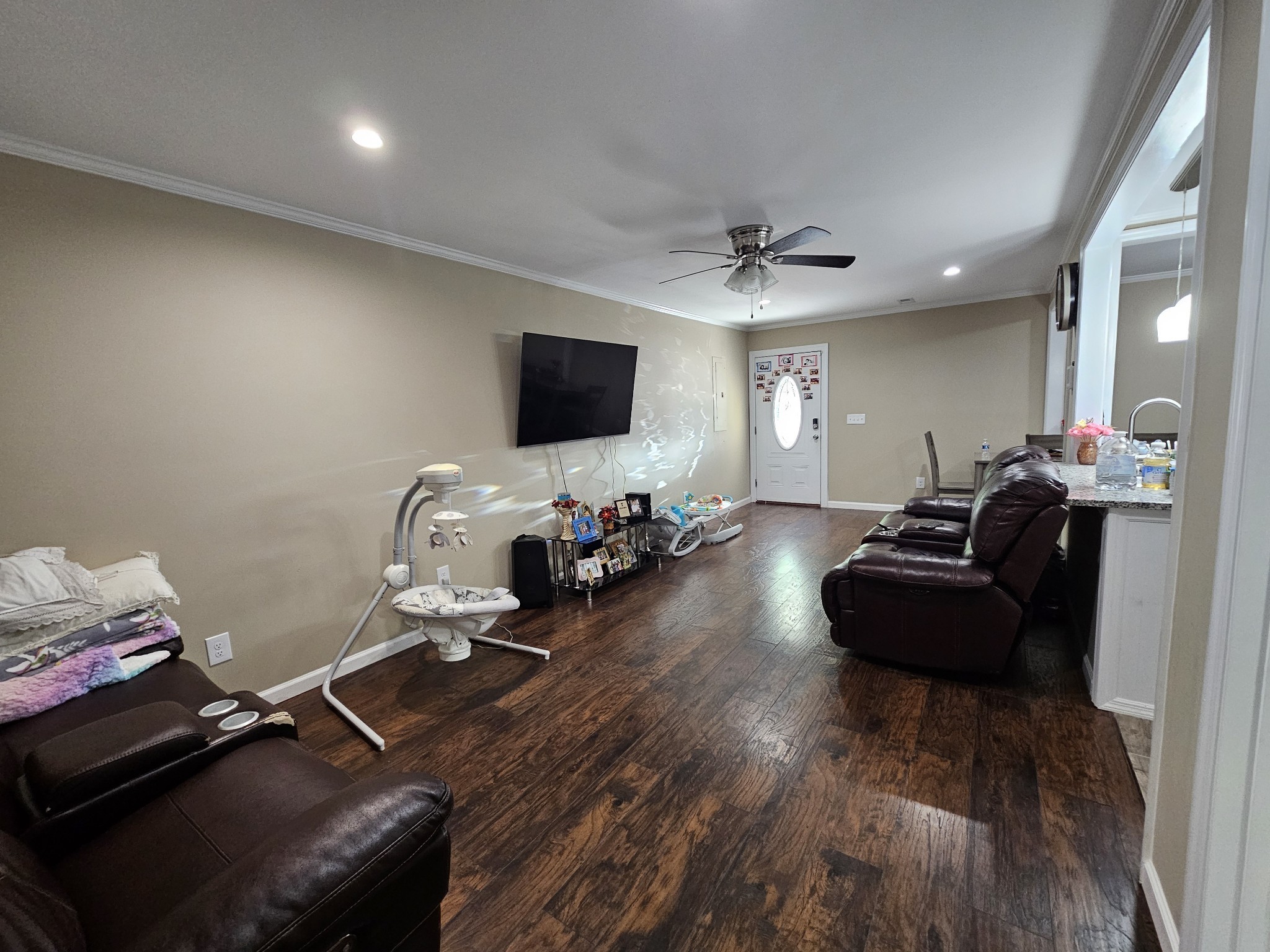 107 Gentry Street Tullahoma, TN 37388 - Photo 11 of 34 a living room with furniture and a flat screen tv