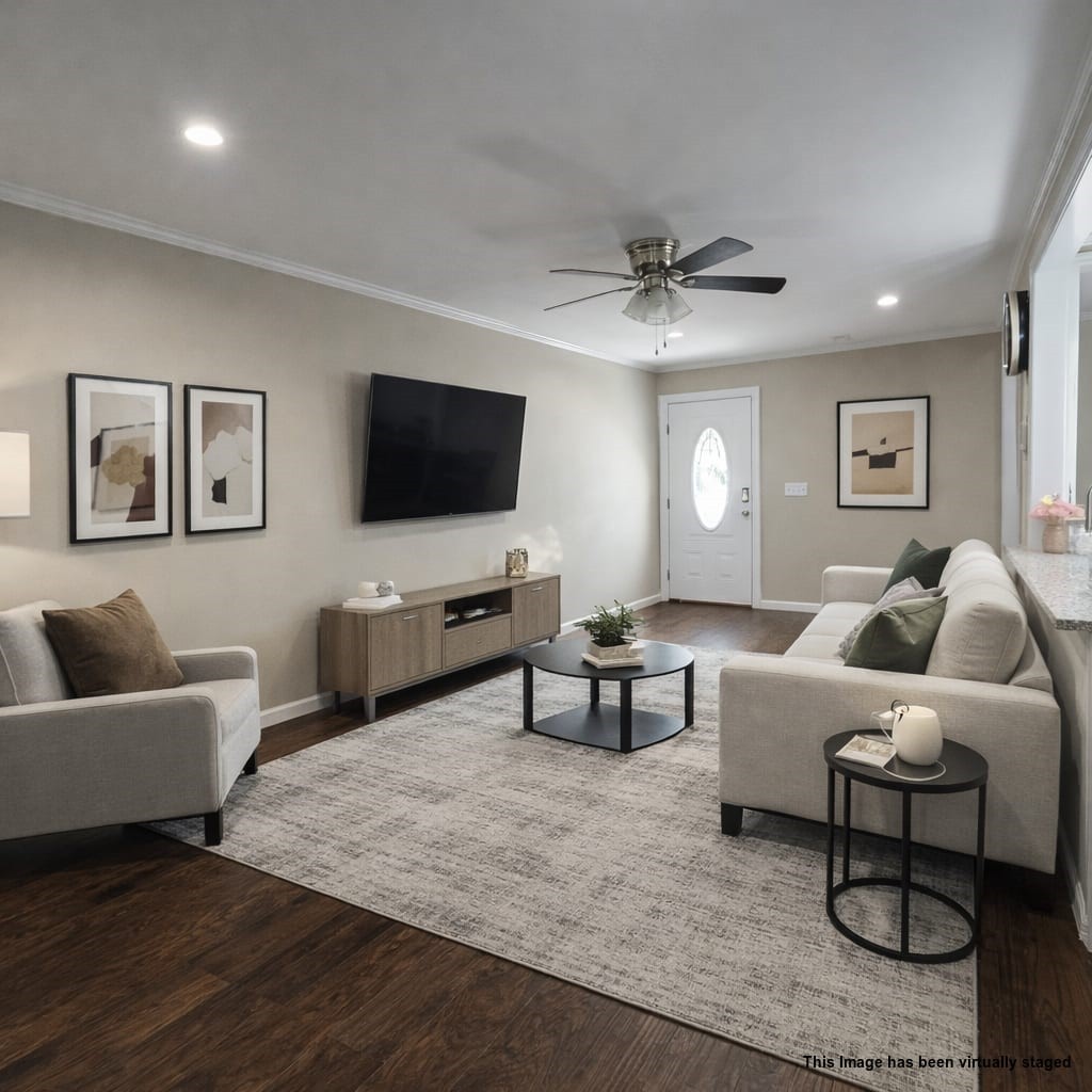 107 Gentry Street Tullahoma, TN 37388 - Photo 12 of 34 a living room with furniture and a flat screen tv