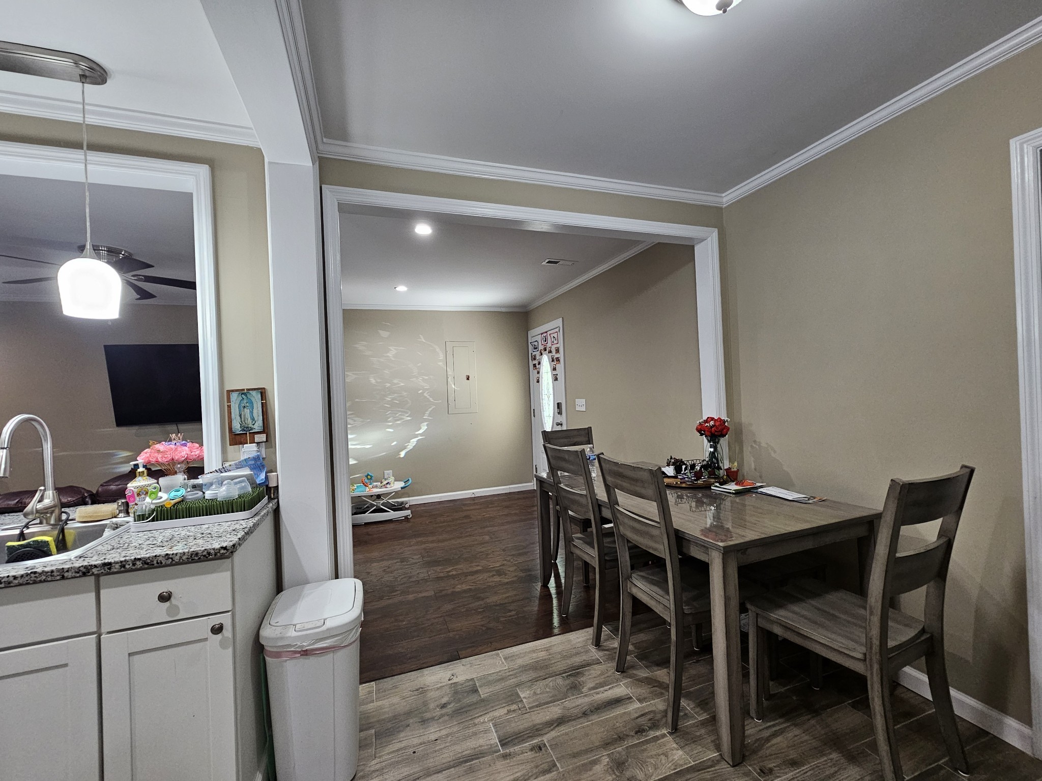 107 Gentry Street Tullahoma, TN 37388 - Photo 15 of 34 a dining room with furniture and wooden floor