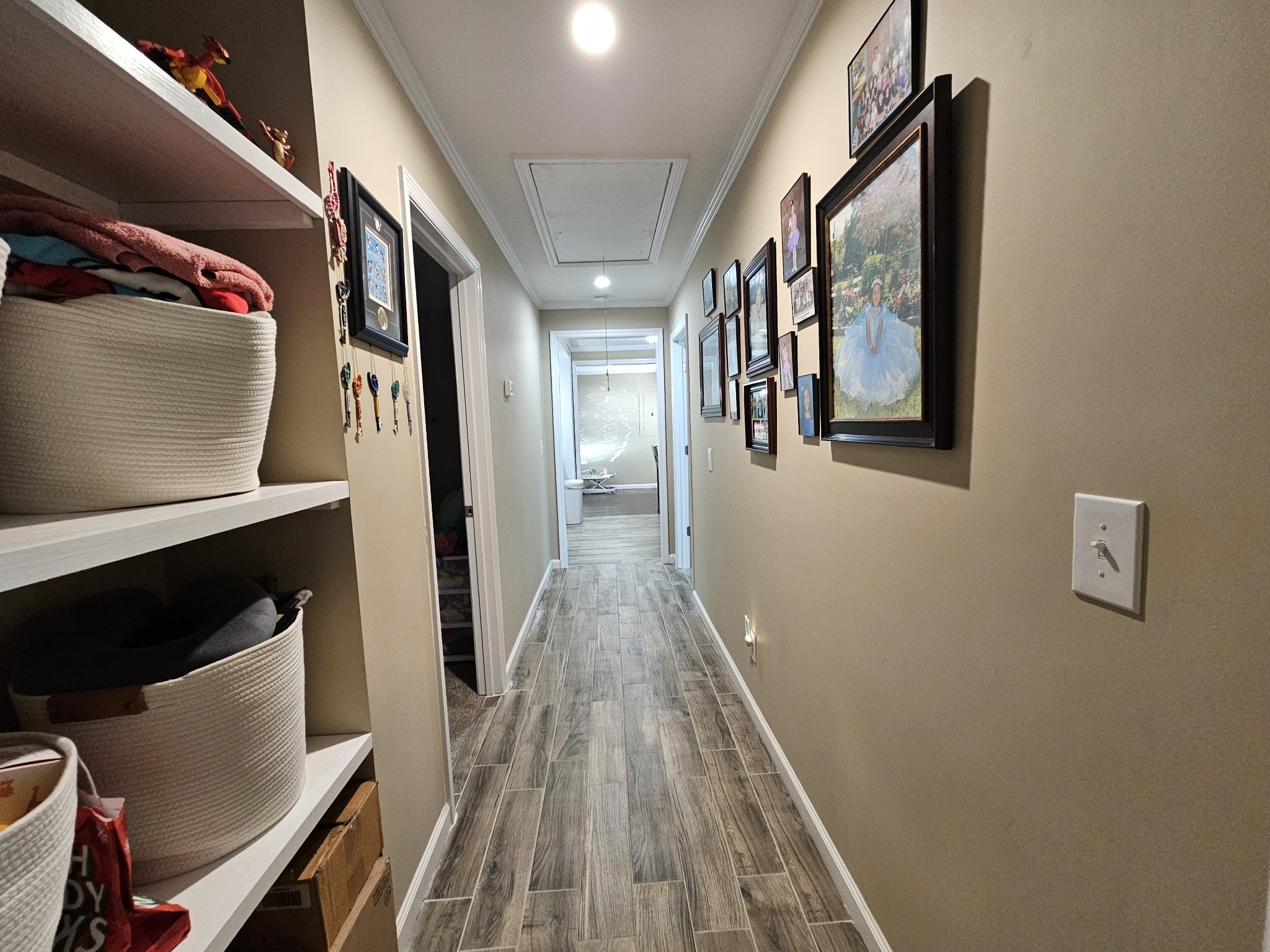 107 Gentry Street Tullahoma, TN 37388 - Photo 26 of 34 a view of hallway with stairs and wooden floor