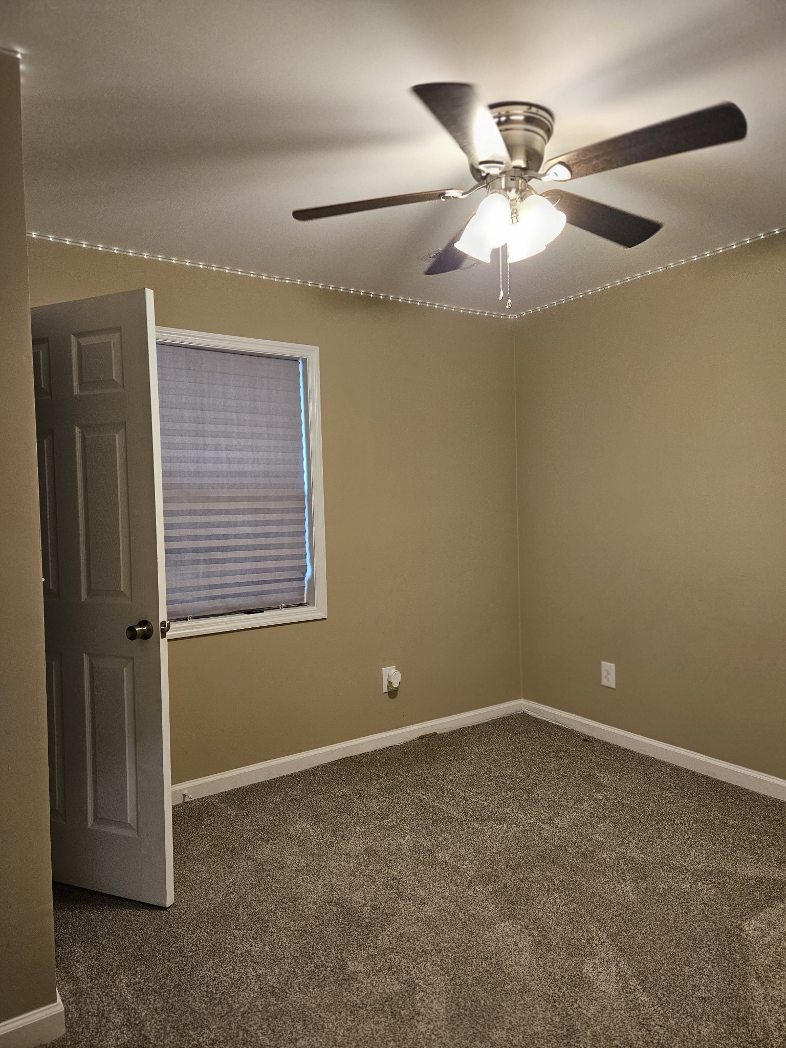 107 Gentry Street Tullahoma, TN 37388 - Photo 29 of 34 a view of an empty room with a ceiling fan