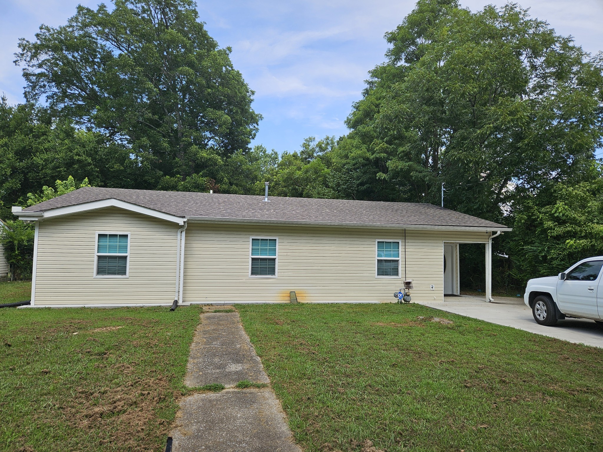 107 Gentry Street Tullahoma, TN 37388 - Photo 33 of 34 a front view of house with yard and green space