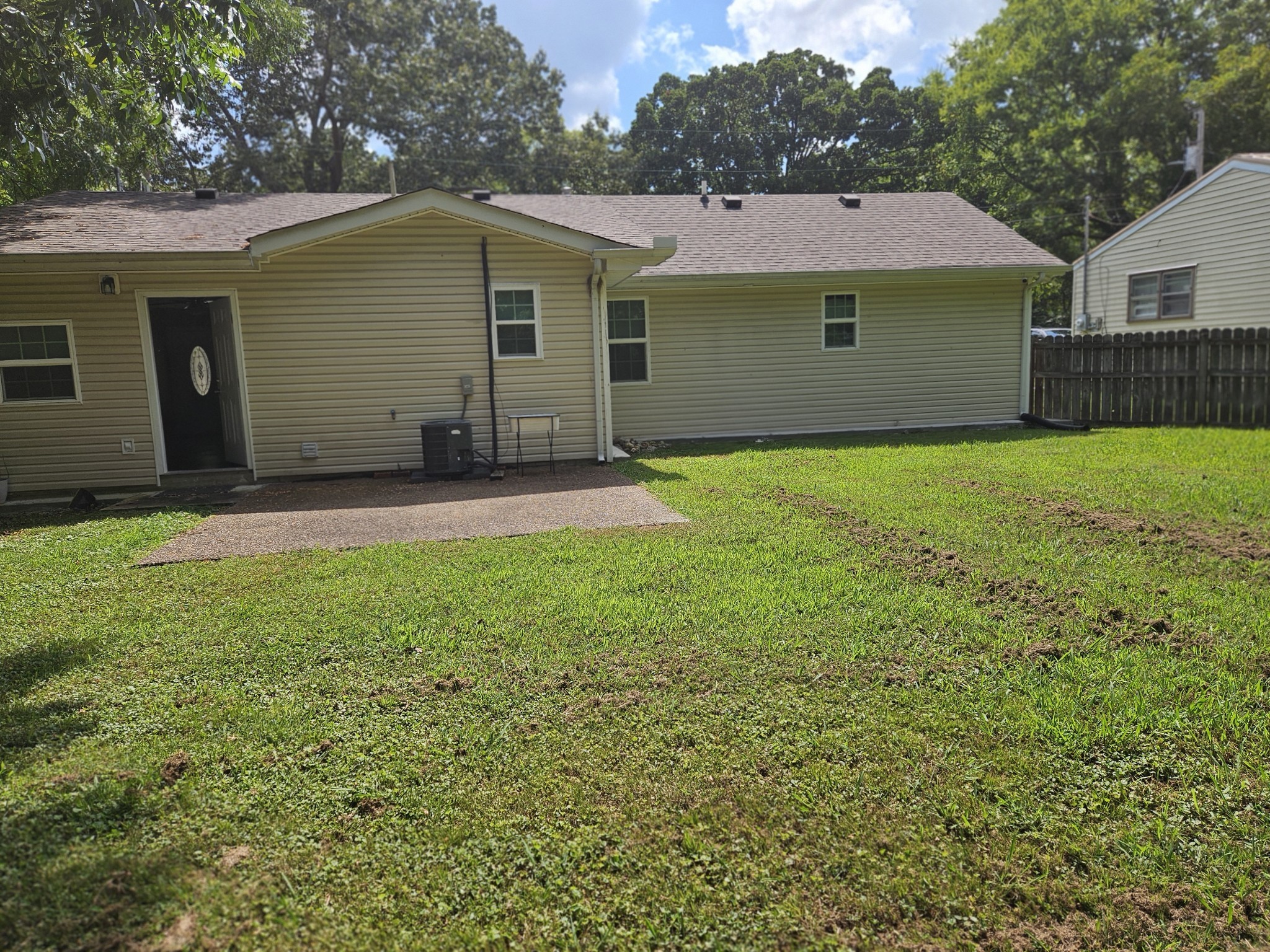 107 Gentry Street Tullahoma, TN 37388 - Photo 7 of 34 a view of a backyard with a garden and plants
