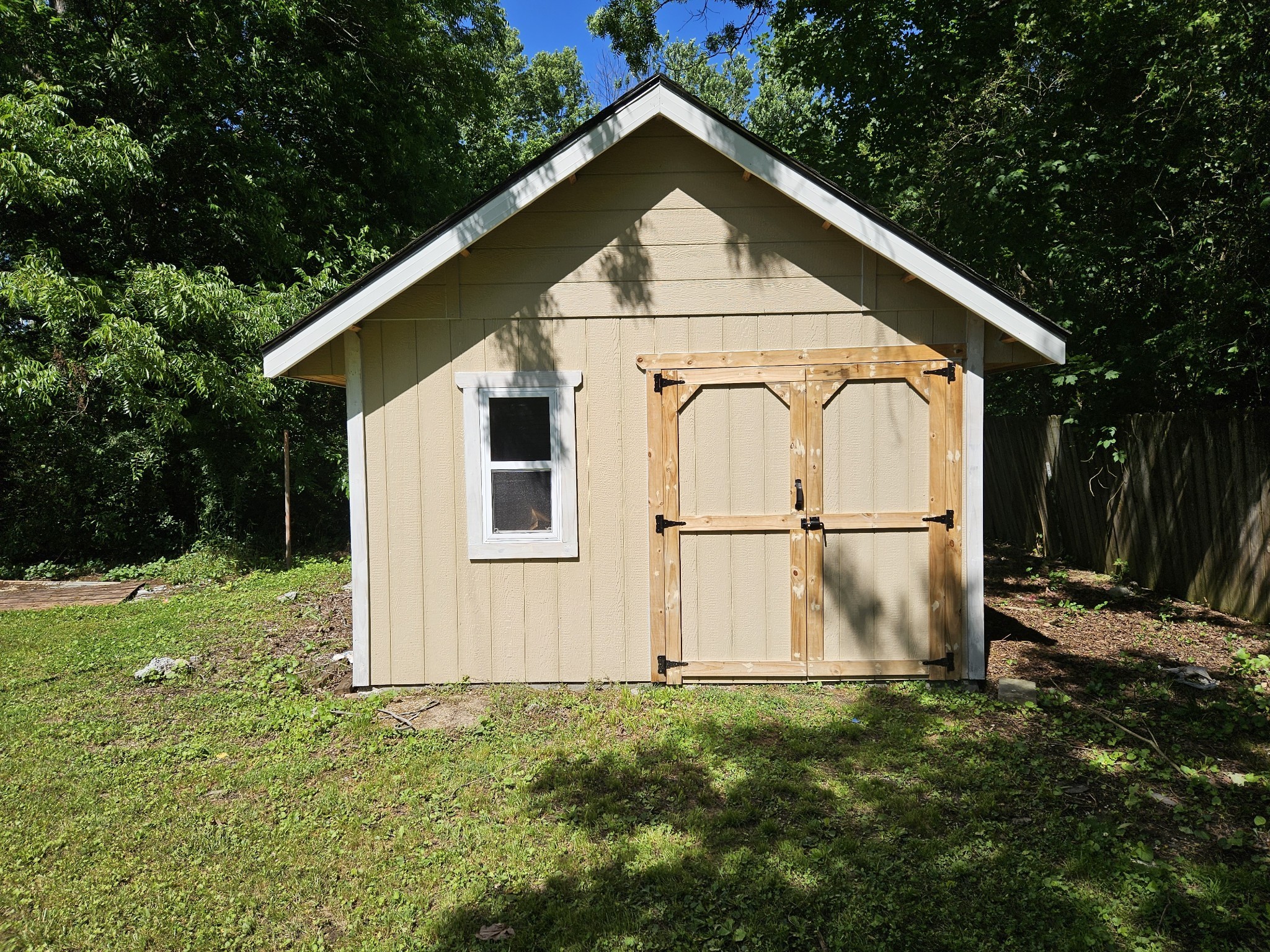 107 Gentry Street Tullahoma, TN 37388 - Photo 8 of 34 a view of a backyard of the house