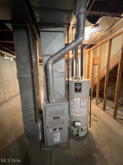 10422 Reno Avenue Cleveland, OH 44105 - Photo 17 of 21 Utility room featuring water heater