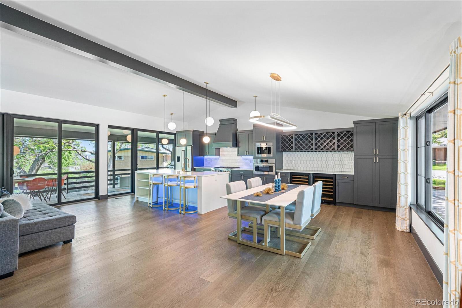 17 Rangeview Drive Wheat Ridge, CO 80215 - Photo 11 of 50 a living room with furniture and a wooden floor