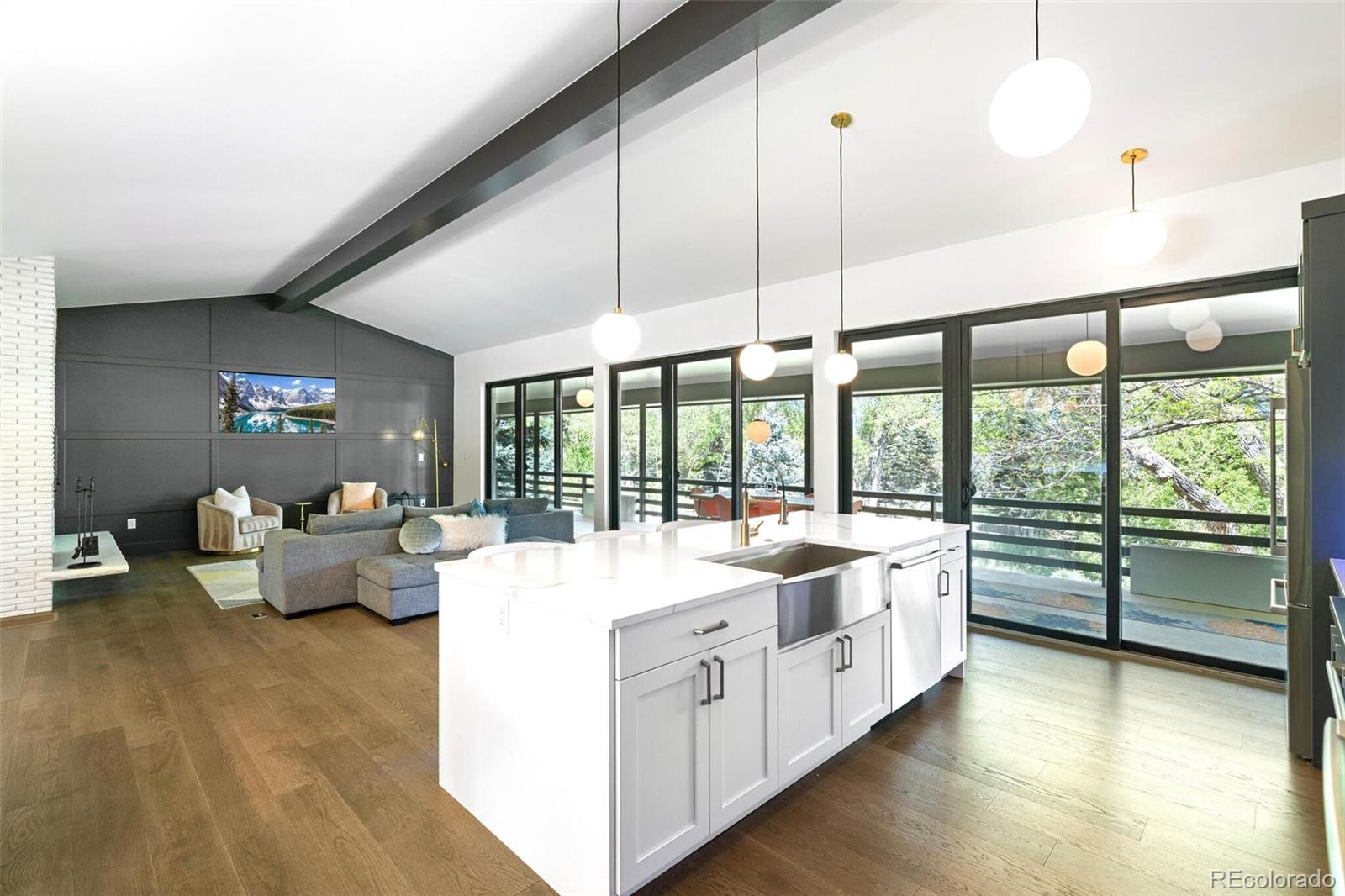 17 Rangeview Drive Wheat Ridge, CO 80215 - Photo 16 of 50 a large white room with a large window