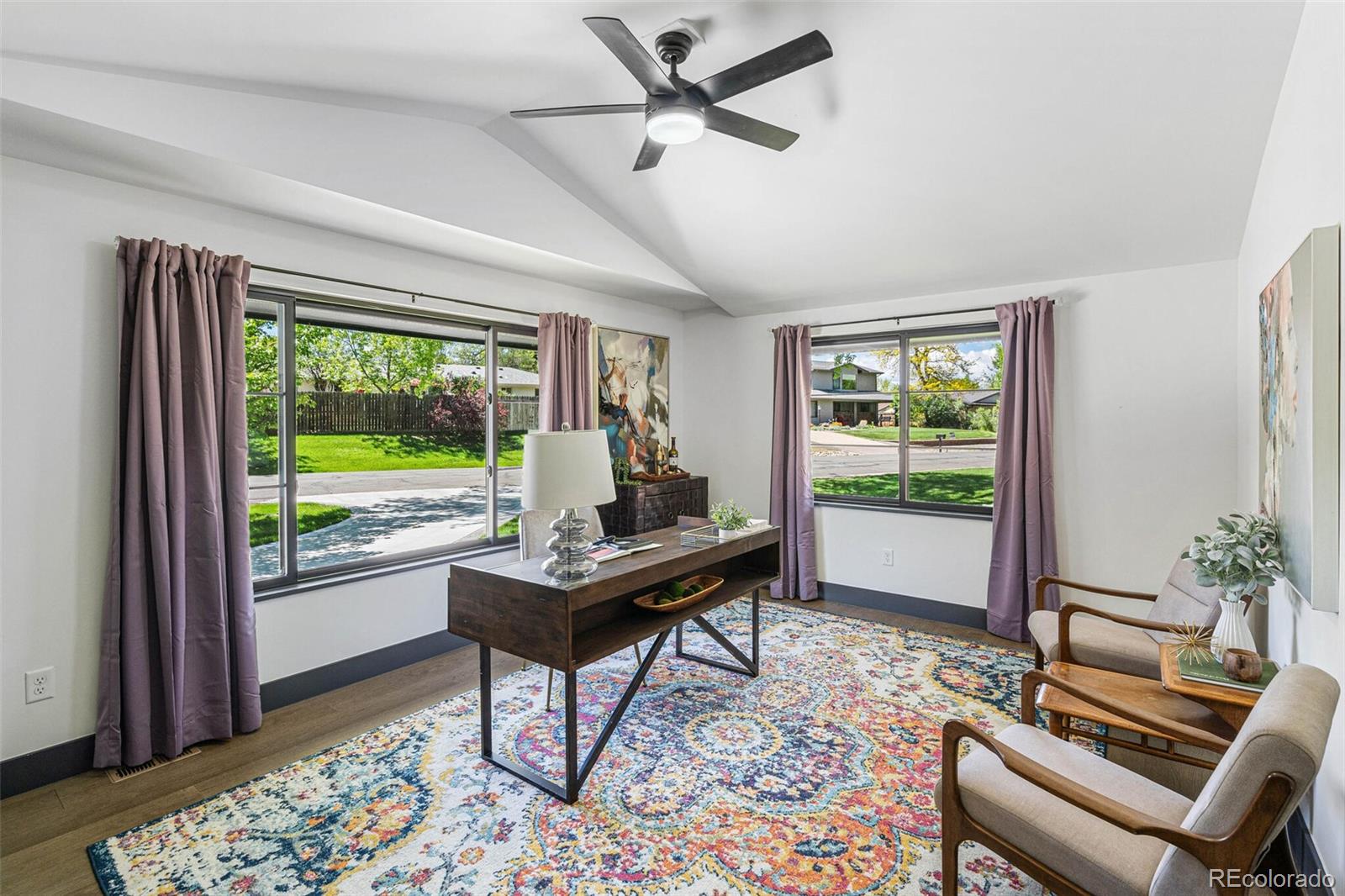 17 Rangeview Drive Wheat Ridge, CO 80215 - Photo 19 of 50 a living room with furniture and a window