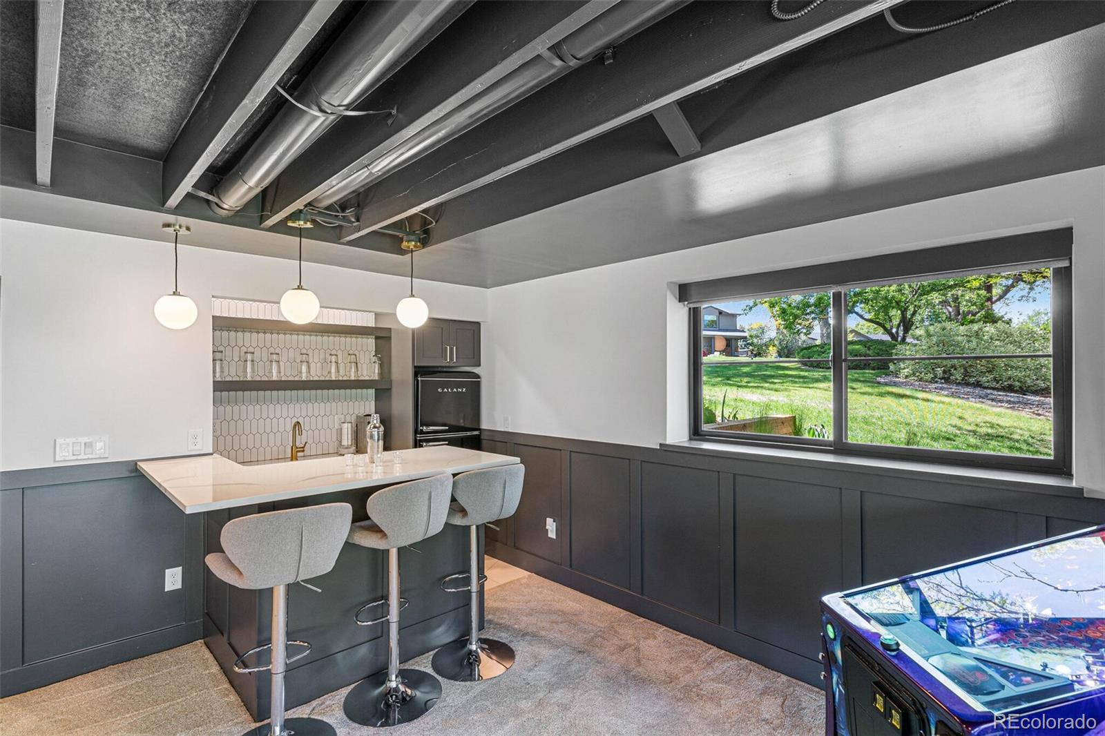 17 Rangeview Drive Wheat Ridge, CO 80215 - Photo 28 of 50 a dining room with furniture and window