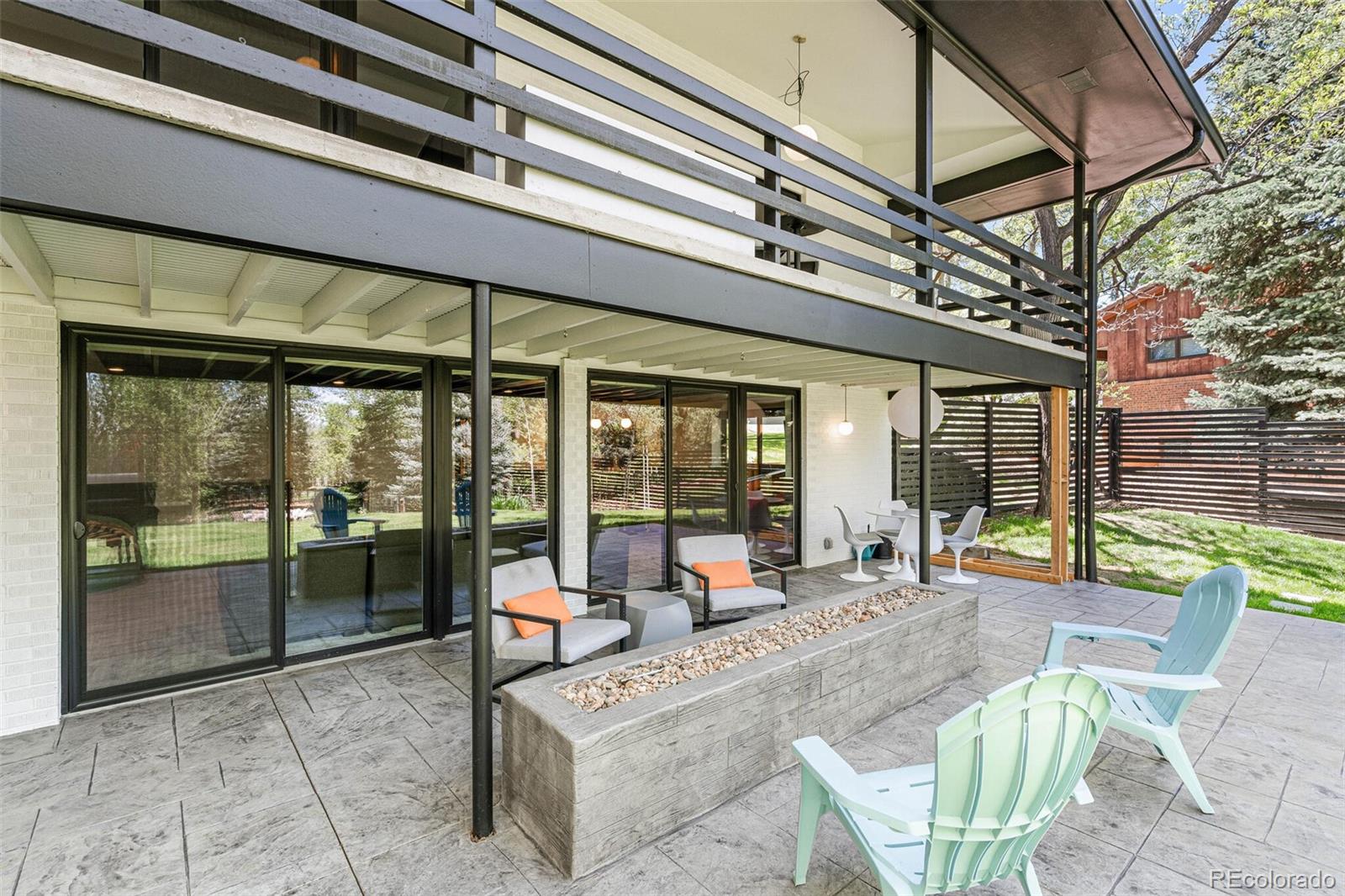 17 Rangeview Drive Wheat Ridge, CO 80215 - Photo 41 of 50 a building outdoor space with patio furniture and potted plants