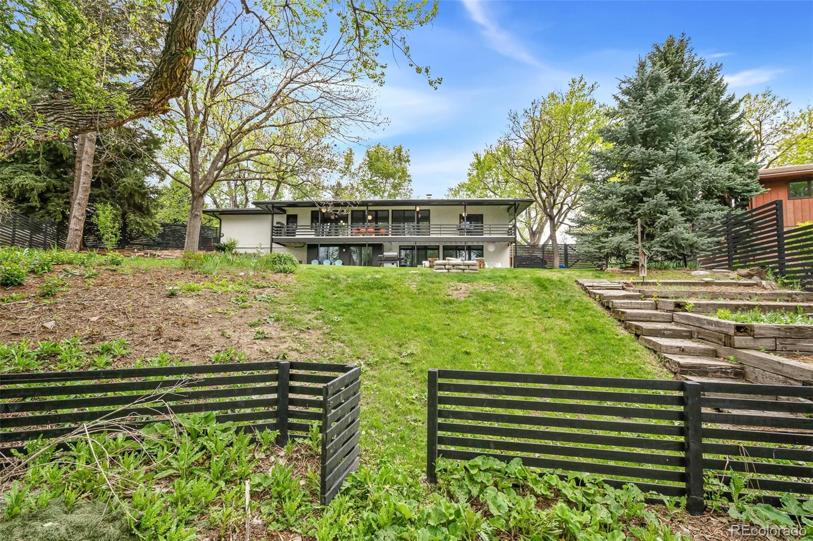 17 Rangeview Drive Wheat Ridge, CO 80215 - Photo 44 of 50 a view of a house with a yard