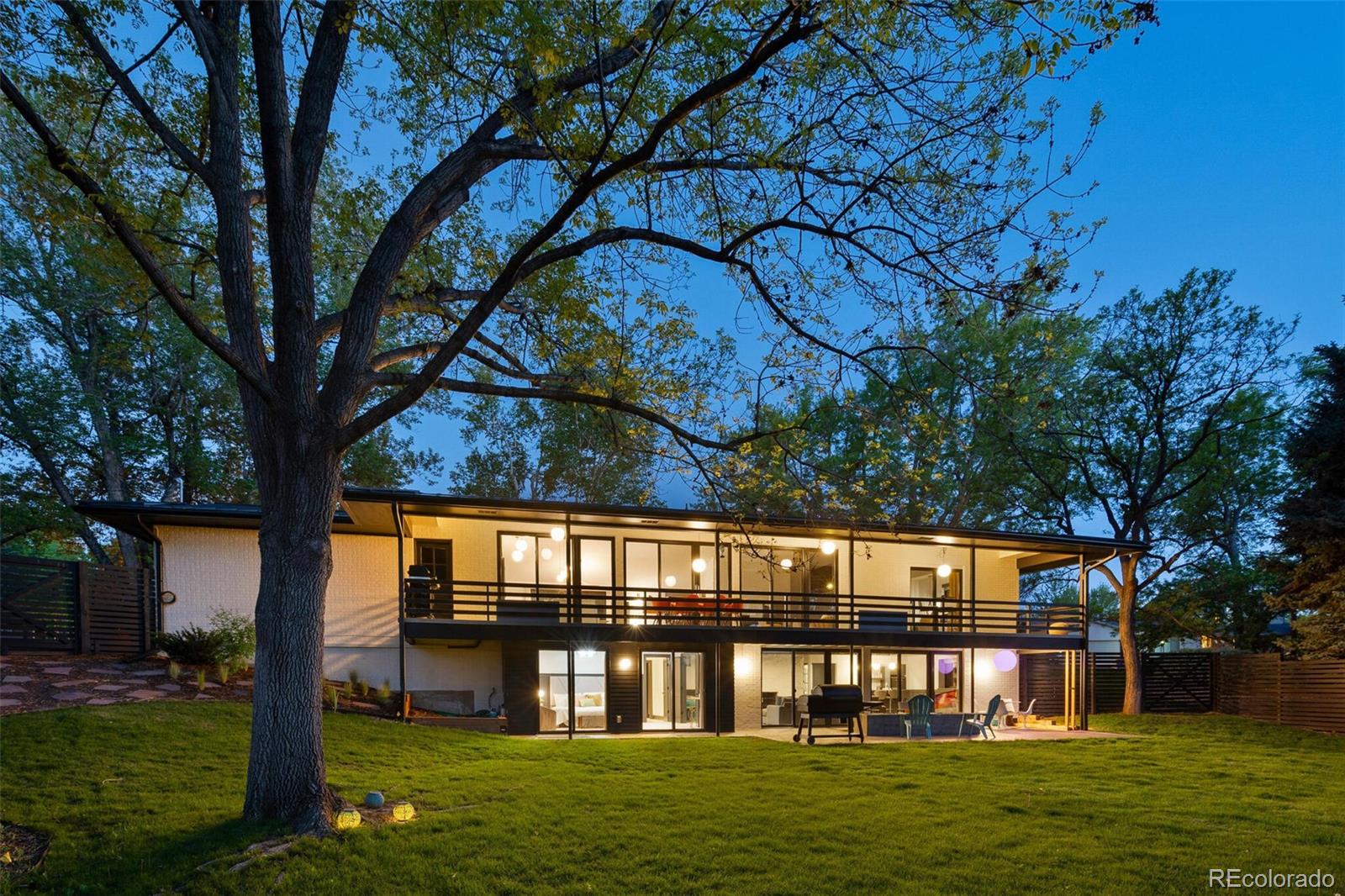17 Rangeview Drive Wheat Ridge, CO 80215 - Photo 45 of 50 a front view of a house with a garden