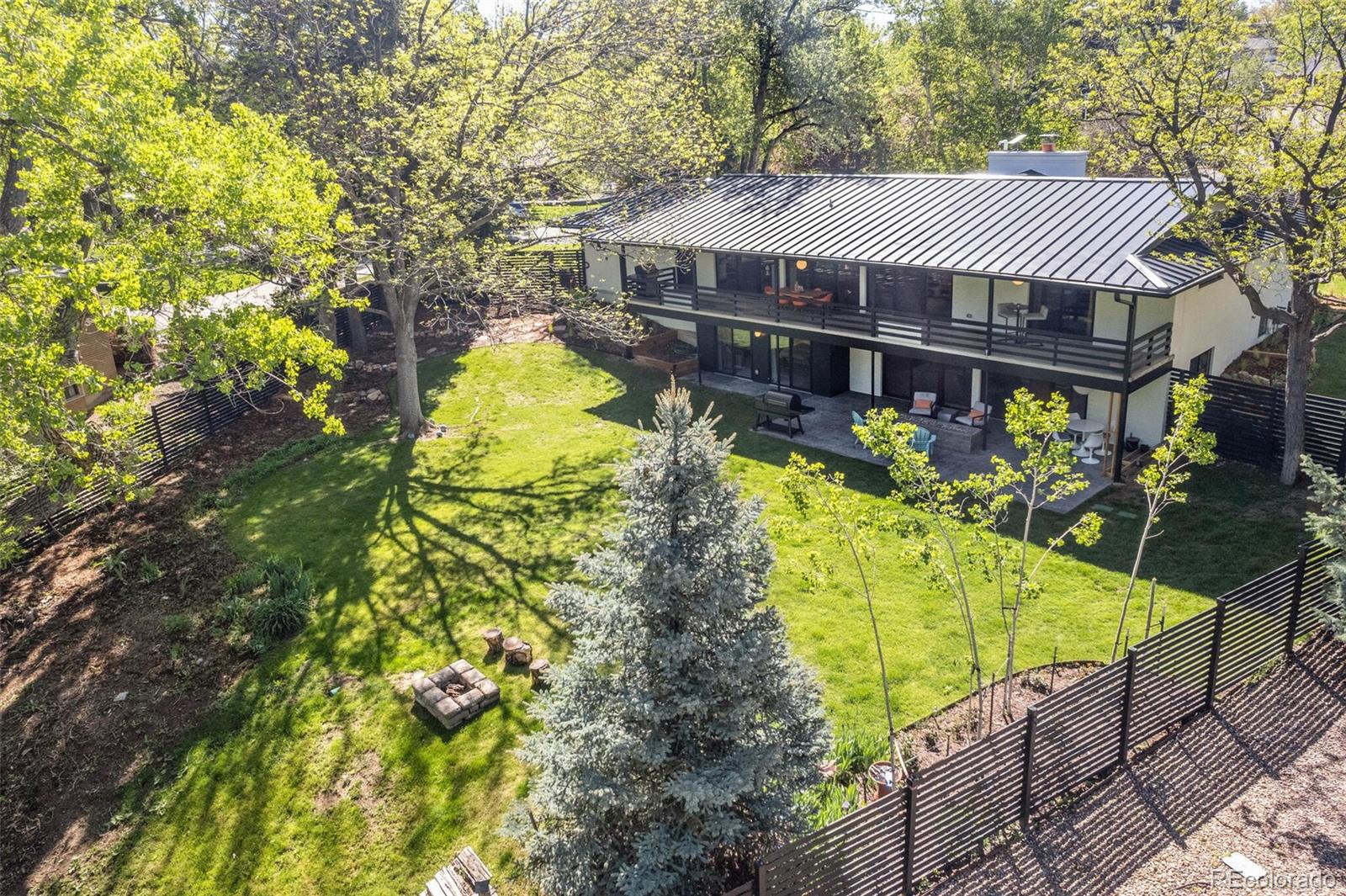 17 Rangeview Drive Wheat Ridge, CO 80215 - Photo 47 of 50 a view of a house with pool and sitting area