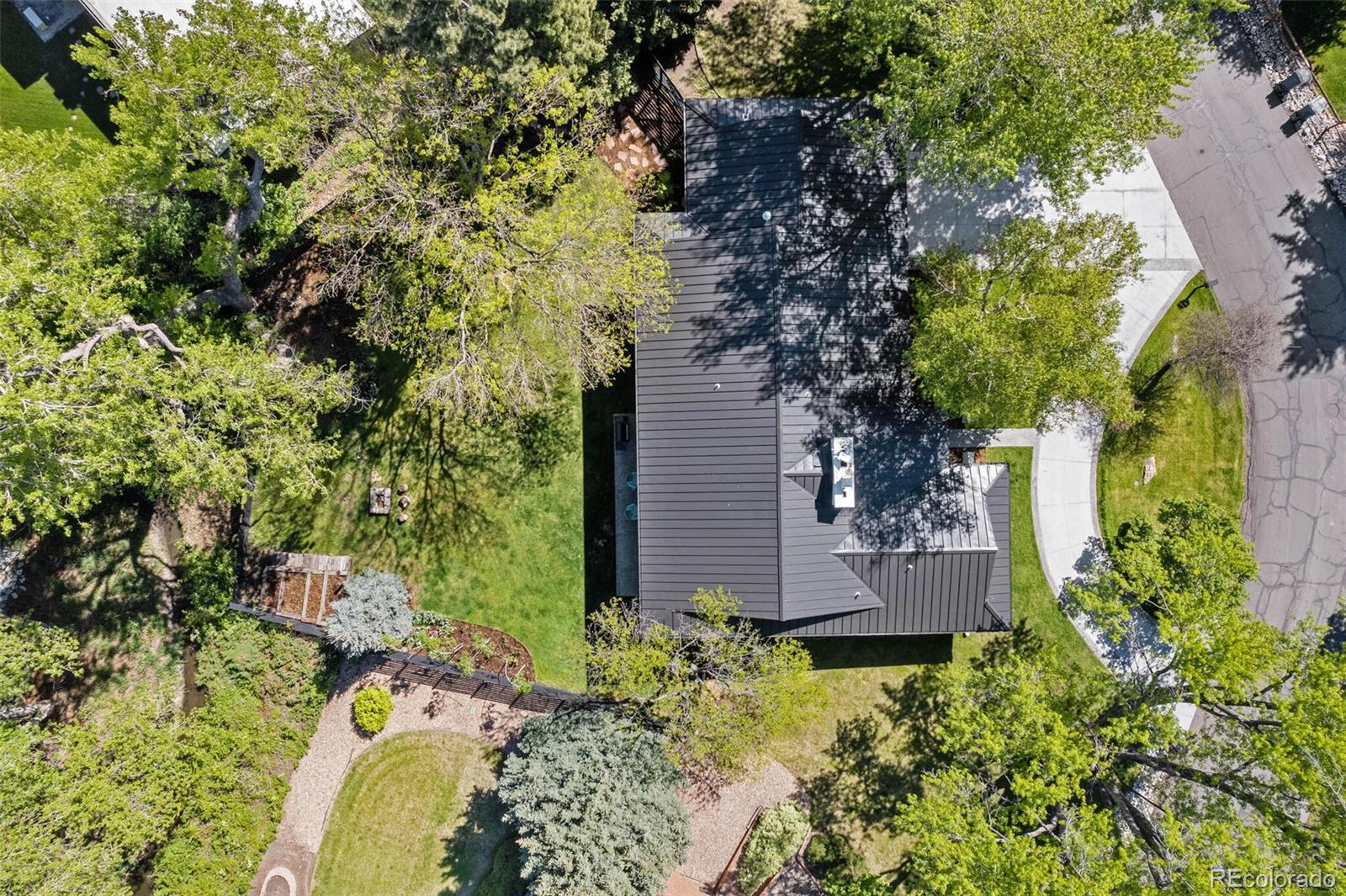 17 Rangeview Drive Wheat Ridge, CO 80215 - Photo 48 of 50 a backyard of a house with lots of green space