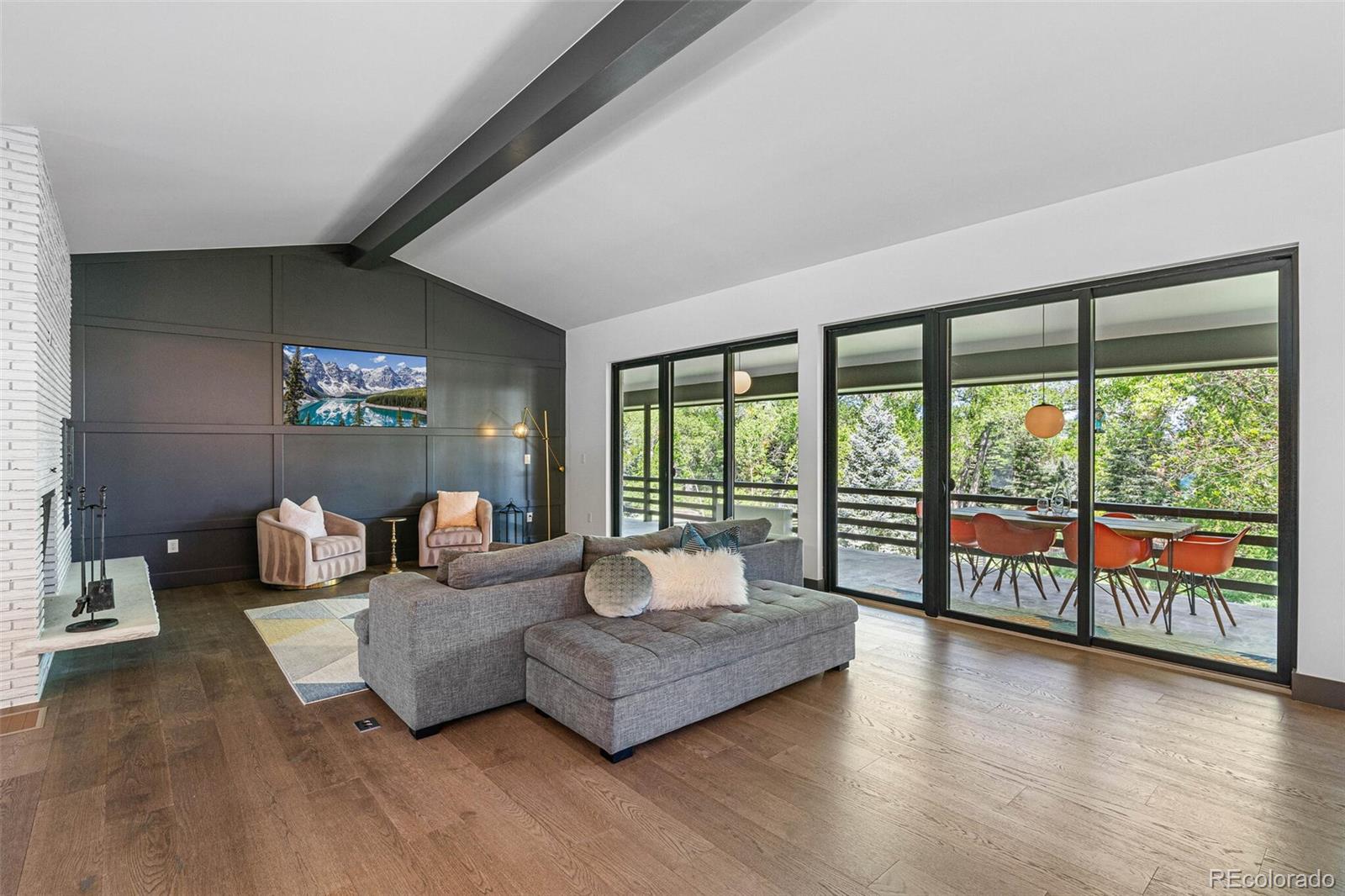 17 Rangeview Drive Wheat Ridge, CO 80215 - Photo 8 of 50 a living room with furniture and a large window
