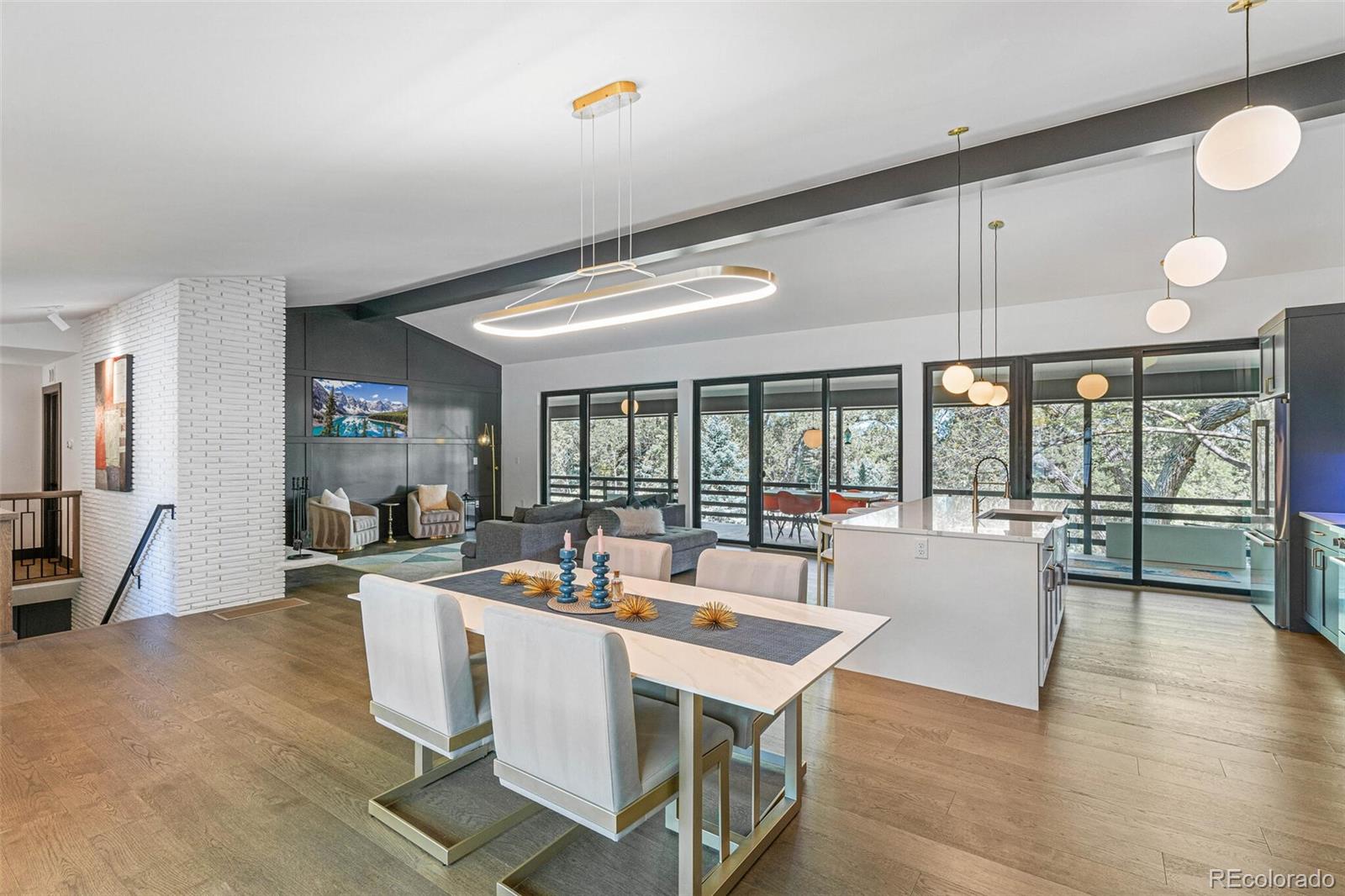 17 Rangeview Drive Wheat Ridge, CO 80215 - Photo 10 of 50 a view of a dining room with furniture window and outside view