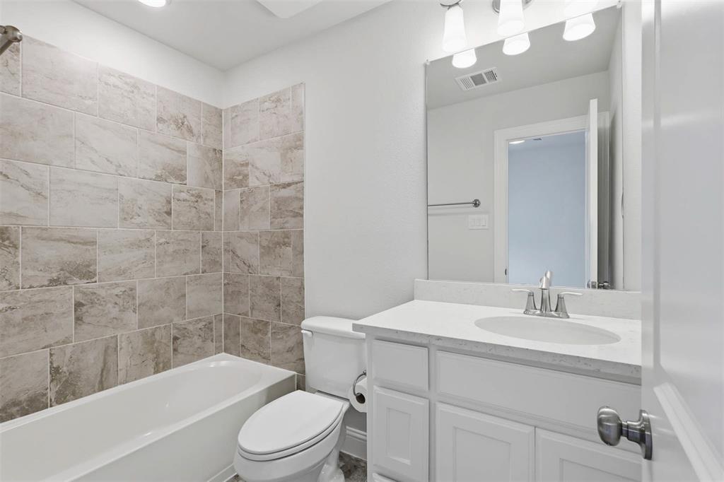 1053 Sarah Street Allen, TX 75013 - Photo 28 of 30 ensuite bathroom for upstairs secondary bedroom