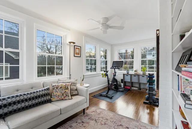 a workspace with furniture and rug