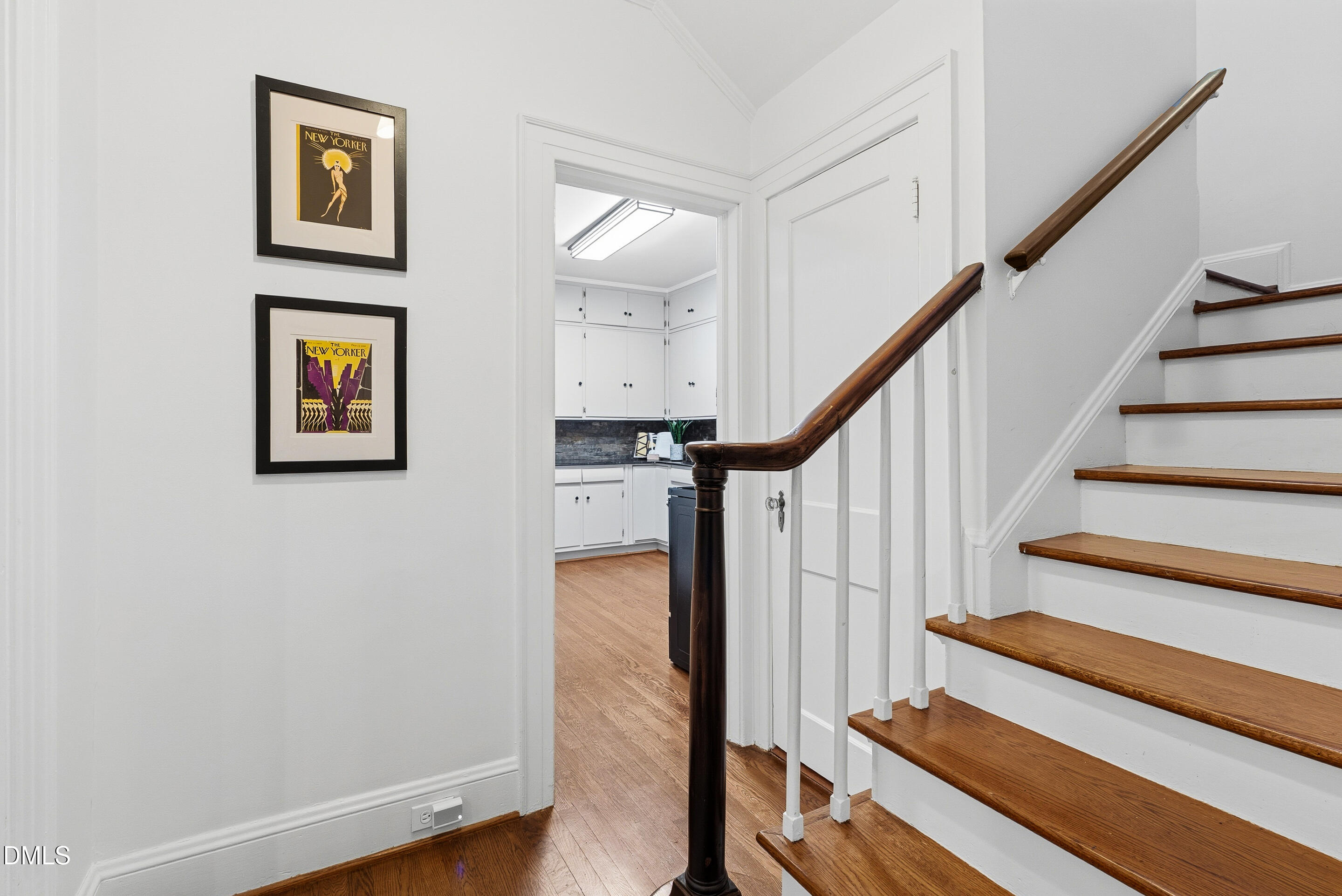 1110 North Gregson Street Durham, NC 27701 - Photo 13 of 38 a view of staircase with wooden floor and windows