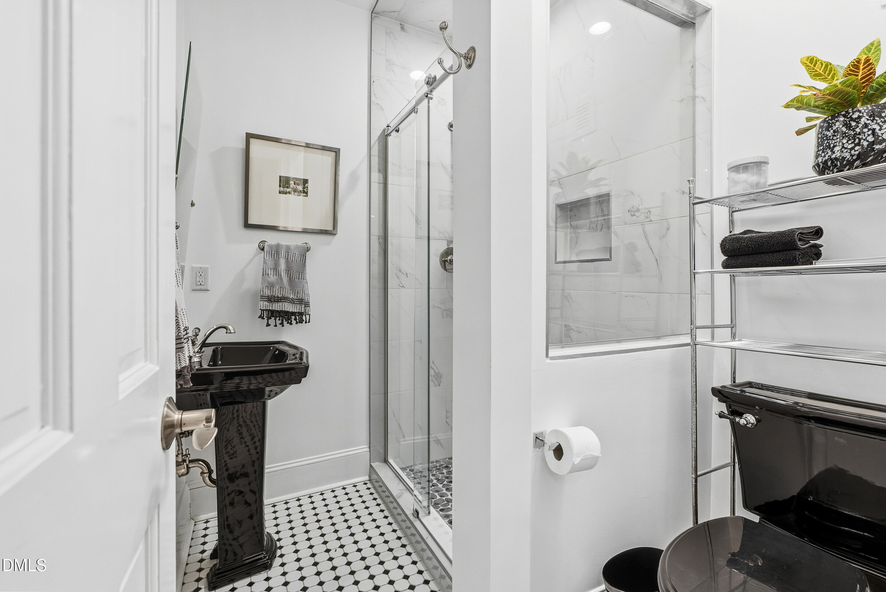 1110 North Gregson Street Durham, NC 27701 - Photo 14 of 38 a bathroom with a sink and a shower