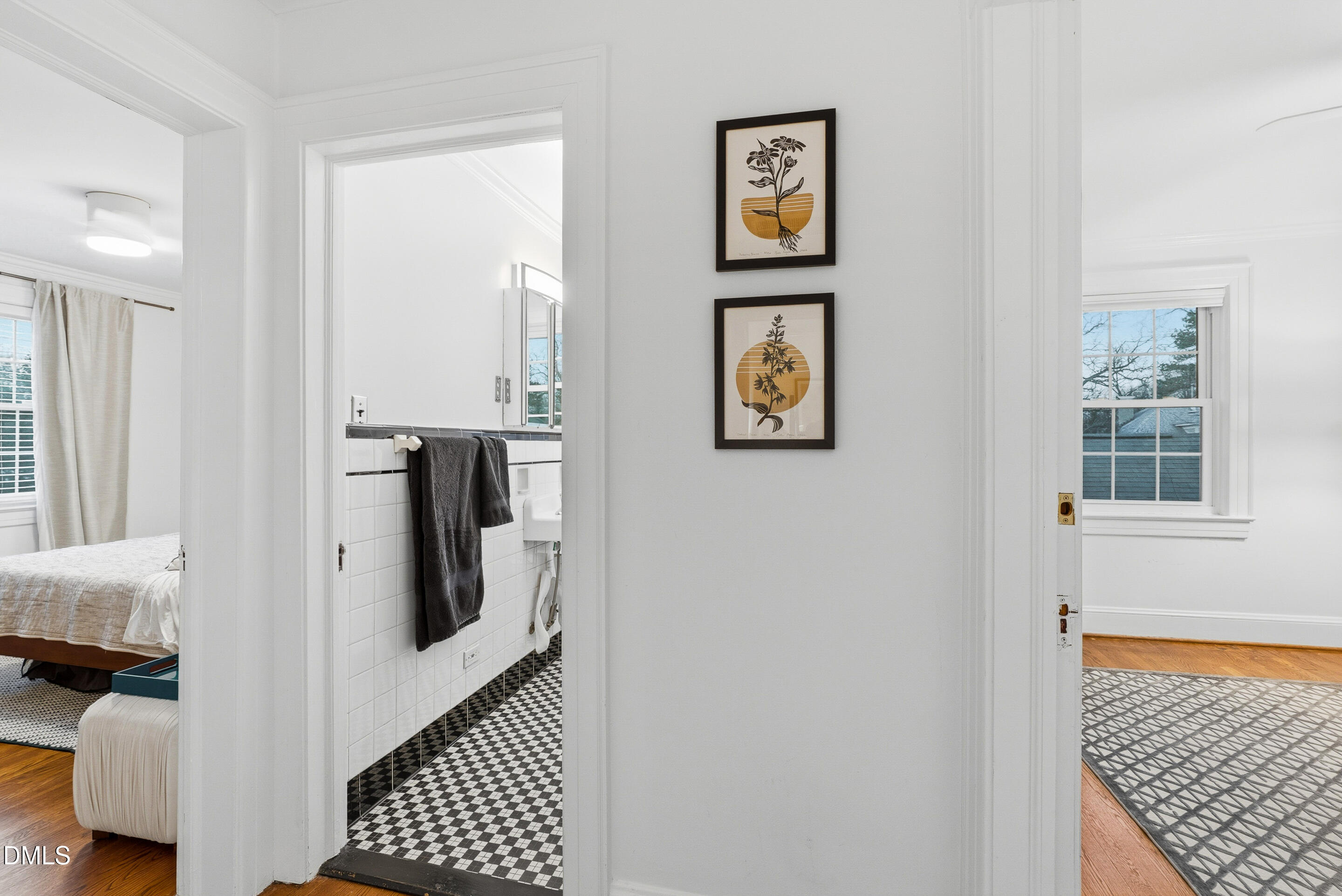 1110 North Gregson Street Durham, NC 27701 - Photo 24 of 38 a view of a hallway with wooden floor and a living room