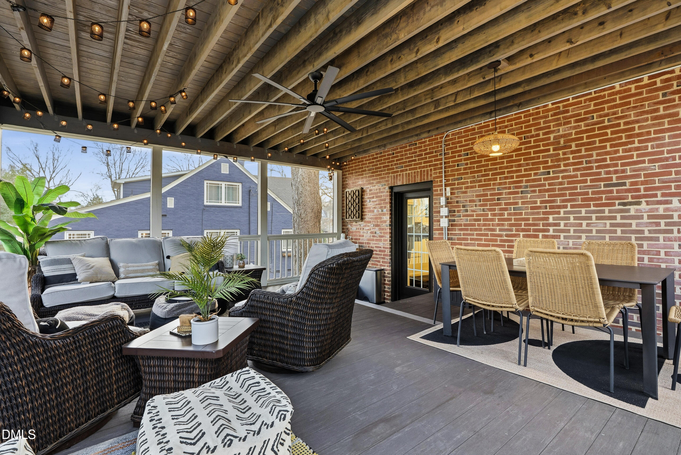1110 North Gregson Street Durham, NC 27701 - Photo 30 of 38 a balcony with furniture and potted plants
