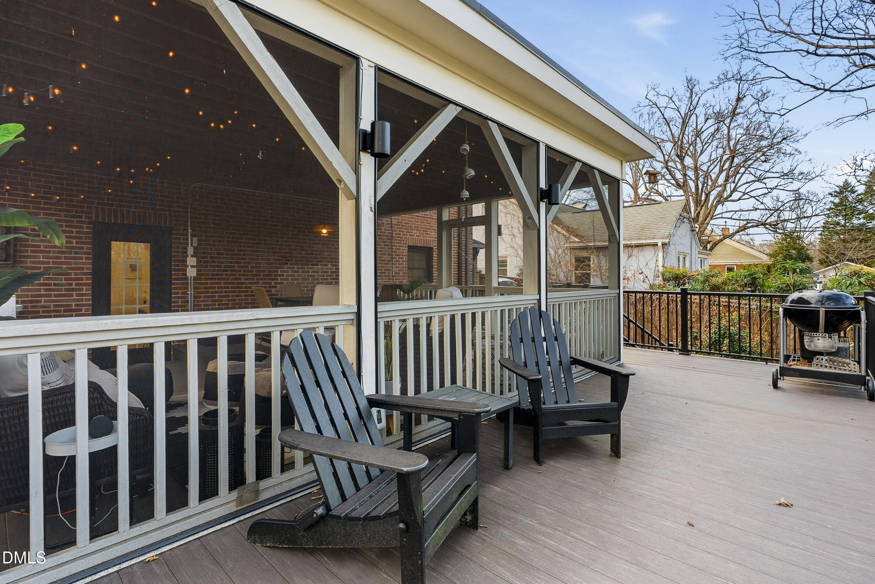 1110 North Gregson Street Durham, NC 27701 - Photo 32 of 38 a view of a porch with furniture and floor to ceiling window