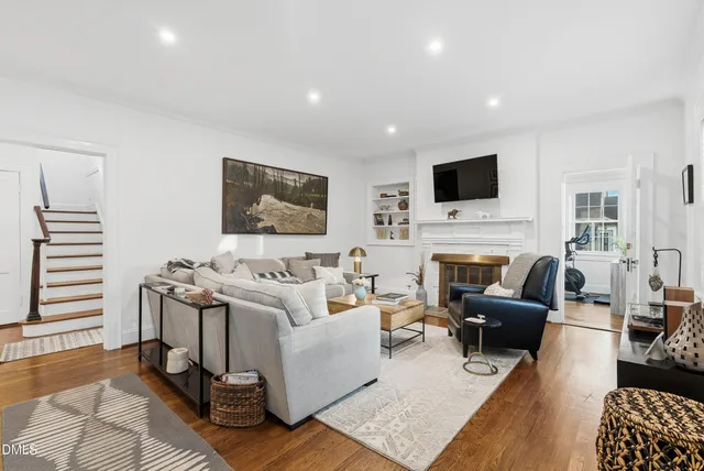 a living room with furniture and windows