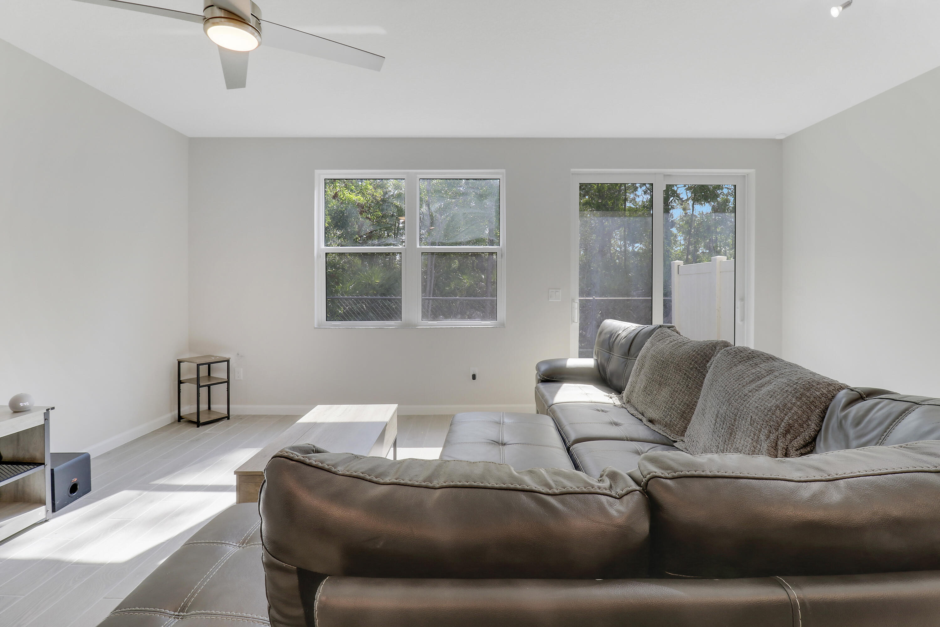 3903 Southeast Mentmore Lane Stuart, FL 34997 - Photo 20 of 35 a living room with furniture and a window